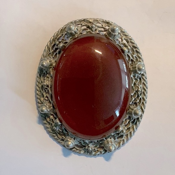 Jewelry - Brooch with large stone set in pewter.